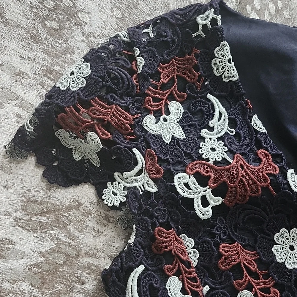 Tory Burch zips back